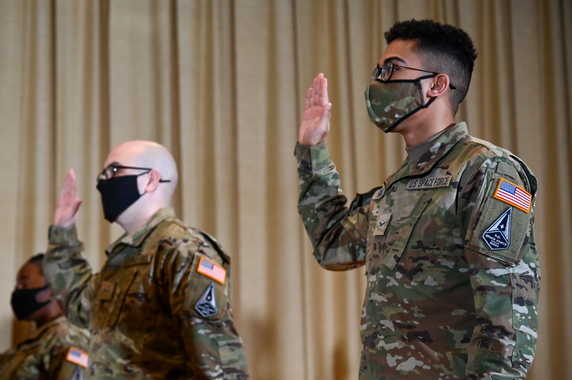 Specialist 3 Michael Shoemo, 729th Air Control Squadron, gives the Oath of Office at the U.S. Space Force Induction Ceremony