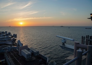 Amphibious assault ship USS Makin Island (LHD 8) transits the Strait of Hormuz, Feb. 8. The Makin Island Amphibious Ready Group and the 15th Marine Expeditionary Unit are deployed to the U.S. 5th Fleet area of operations in support of naval operations to ensure maritime stability and security in the Central Region, connecting the Mediterranean and Pacific through the western Indian Ocean and three strategic choke points. (U.S.Marine Corps photo by Lance Cpl. Mackenzie Binion)