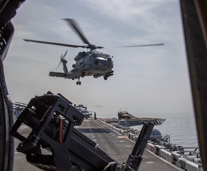 A MH-60R Sea Hawk helicopter, attached to Helicopter Maritime Strike Squadron (HSM) 49, takes off from the flight deck amphibious assault ship USS Makin Island (LHD 8) during a Strait of Hormuz transit, Feb. 8. The Makin Island Amphibious Ready Group and the 15th Marine Expeditionary Unit are deployed to the U.S. 5th Fleet area of operations in support of naval operations to ensure maritime stability and security in the Central Region, connecting the Mediterranean and Pacific through the western Indian Ocean and three strategic choke points. (U.S. Navy photo by Mass Communication Specialist 3rd Class Ethan Jaymes Morrow)