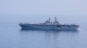 Amphibious assault ship USS Makin Island (LHD 8) transits the Strait of Hormuz, Feb. 8. The Makin Island Amphibious Ready Group and the 15th Marine Expeditionary Unit are deployed to the U.S. 5th Fleet area of operations in support of naval operations to ensure maritime stability and security in the Central Region, connecting the Mediterranean and Pacific through the western Indian Ocean and three strategic choke points. (U.S. Navy photo by Mass Communication Specialist 3rd Class Ethan Jaymes Morrow)