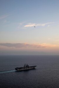 Amphibious assault ship USS Makin Island (LHD 8) and the embarked 15th Marine Expeditionary Unit (MEU) transit the Strait of Hormuz, Feb. 8. The Makin Island Amphibious Ready Group and the 15th MEU are deployed to the U.S. 5th Fleet area of operations in support of naval operations to ensure maritime stability and security in the Central Region, connecting the Mediterranean and Pacific through the western Indian Ocean and three strategic choke points. (U.S. Navy photo by Mass Communication Specialist 2nd Class Jacob D. Bergh)