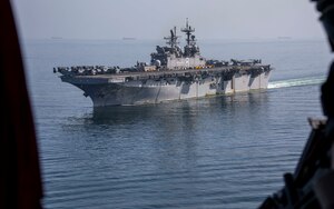 Amphibious assault ship USS Makin Island (LHD 8) transits the Strait of Hormuz, Feb. 8. The Makin Island Amphibious Ready Group and the 15th Marine Expeditionary Unit are deployed to the U.S. 5th Fleet area of operations in support of naval operations to ensure maritime stability and security in the Central Region, connecting the Mediterranean and Pacific through the western Indian Ocean and three strategic choke points. (U.S. Navy photo by Mass Communication Specialist 3rd Class Ethan Jaymes Morrow)