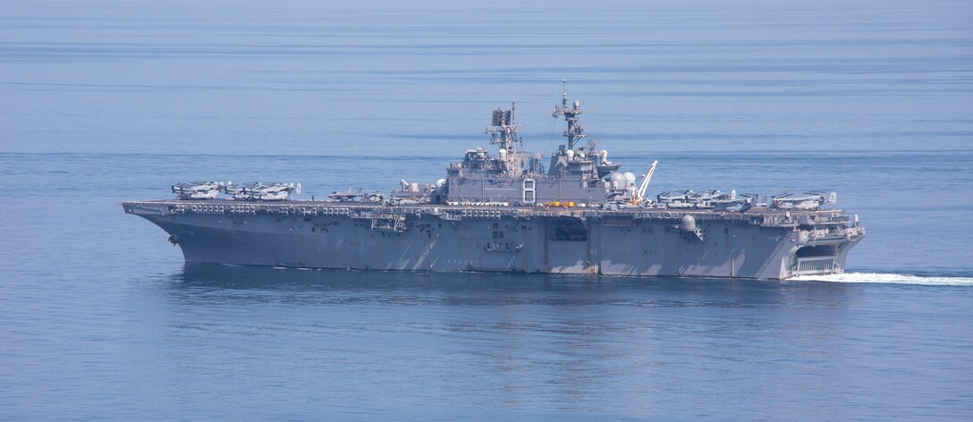 Amphibious assault ship USS Makin Island (LHD 8) transits the Strait of Hormuz, Feb. 8. The Makin Island Amphibious Ready Group and the 15th Marine Expeditionary Unit are deployed to the U.S. 5th Fleet area of operations in support of naval operations to ensure maritime stability and security in the Central Region, connecting the Mediterranean and Pacific through the western Indian Ocean and three strategic choke points. (U.S. Navy photo by Mass Communication Specialist 3rd Class Ethan Jaymes Morrow)