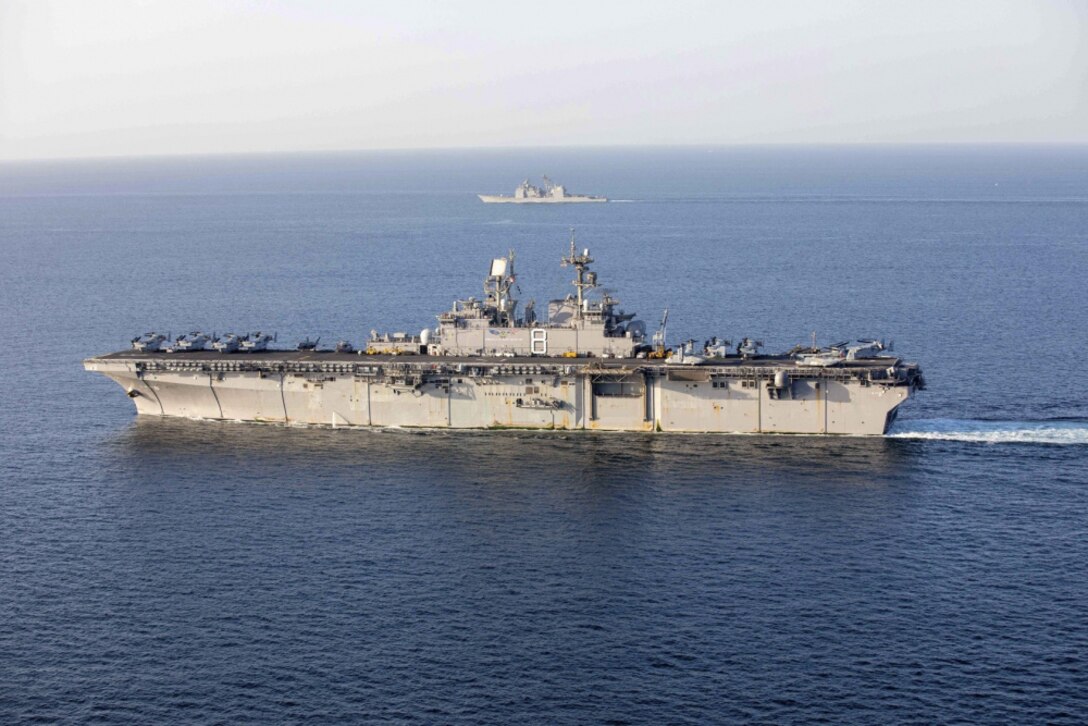 210205-N-LR905-1230 STRAIT OF HORMUZ (Feb. 8, 2021) – Amphibious assault ship USS Makin Island (LHD 8) and the embarked 15th Marine Expeditionary Unit (MEU) transit the Strait of Hormuz, Feb. 8. The Makin Island Amphibious Ready Group and the 15th MEU are deployed to the U.S. 5th Fleet area of operations in support of naval operations to ensure maritime stability and security in the Central Region, connecting the Mediterranean and Pacific through the western Indian Ocean and three strategic choke points. (U.S. Navy photo by Mass Communication Specialist 2nd Class Jacob D. Bergh)