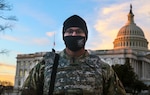 1st Lt. Darren Tanis, executive officer of the Michigan Army National Guard’s 1433rd Engineer Company, based in Fort Custer, Michigan, stands near the U.S. Capitol in Washington Feb. 3, 2021. The National Guard is supporting federal law enforcement in the nation's capital through mid-March.