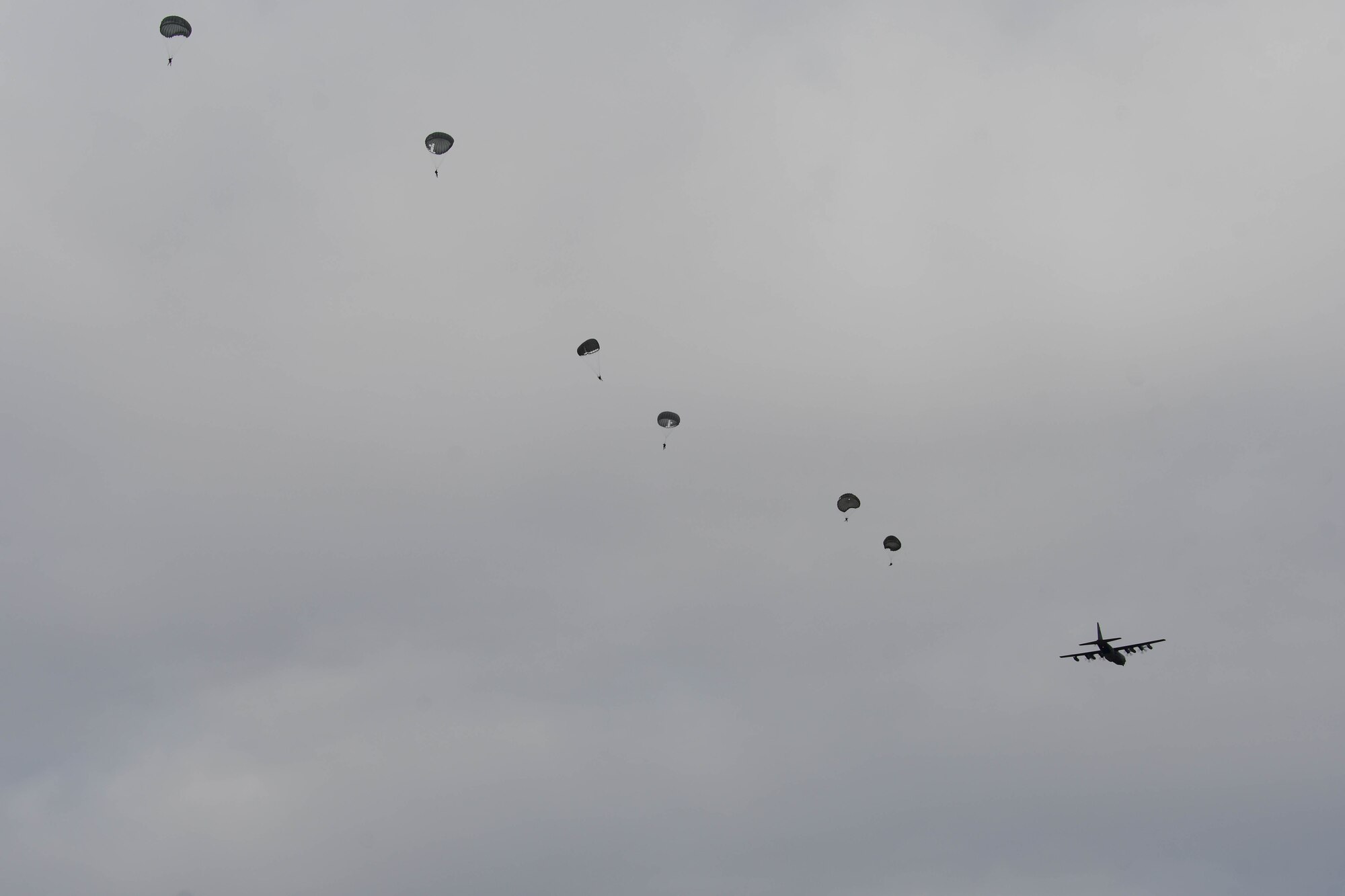 Pararescuemen jumping from HC-130J