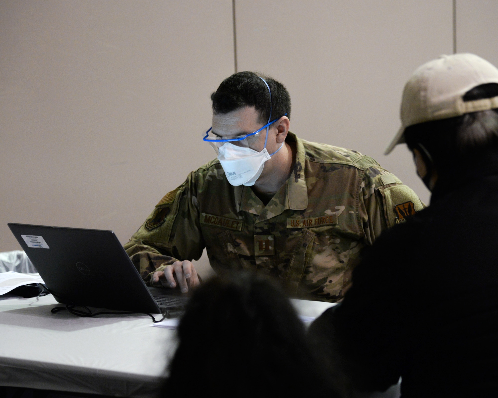 An image of Nj Air National Guard members serving at the Atlantic City Convention Center, Atlantic City, N.J. to help the residents of New Jersey to receive the COVID-19 vaccination at the Atlantic County Point Of Distribution mega-site.