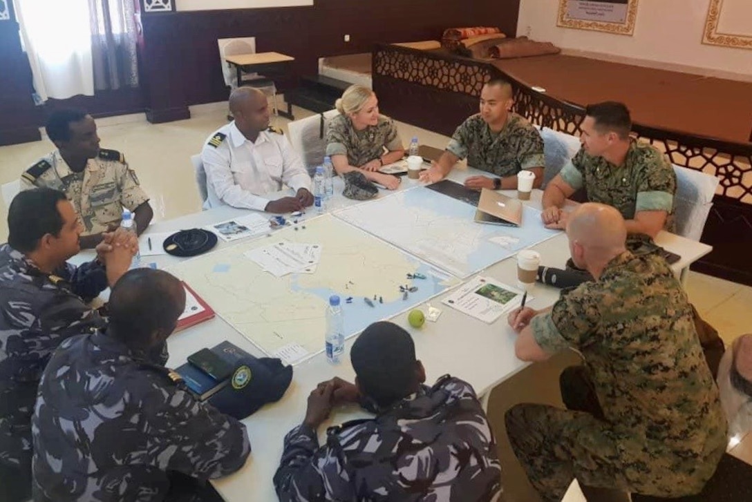 MARFOREUR/AF, Capt Burgett (Regional Planner and Africa Regional Affairs Officer), Capt Halverson (Africa Foreign Area Officer In-Training) with MCSCG, Maj Osborne (Africa Section Deputy) and SSgt Wee (Africa Foreign Area SNCO), conducted a Maritime Operations Center Ground Force Integration (MOC-GFI) table top exercise with the Djiboutian Military from. This exercise is in conjunction with CUTLASS EXPRESS 19.2.