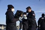 The Coast Guard Cutter Campbell (WMEC 909) crew offloads approximately 7,250 pounds of cocaine at Port Everglades, Florida, Feb. 4, 2021.