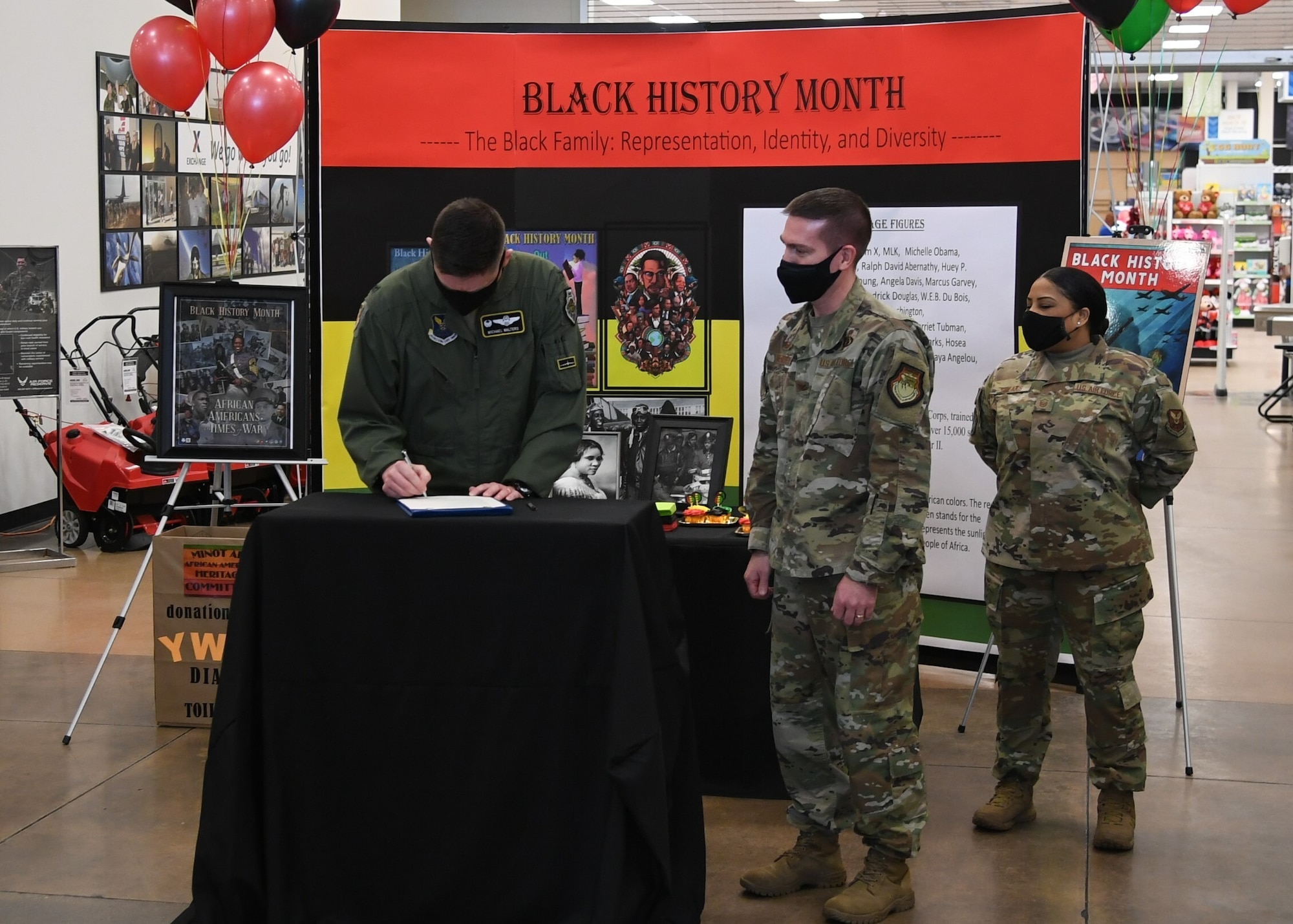 Minot Air Force Base leadership signs a Black History Month proclamation.