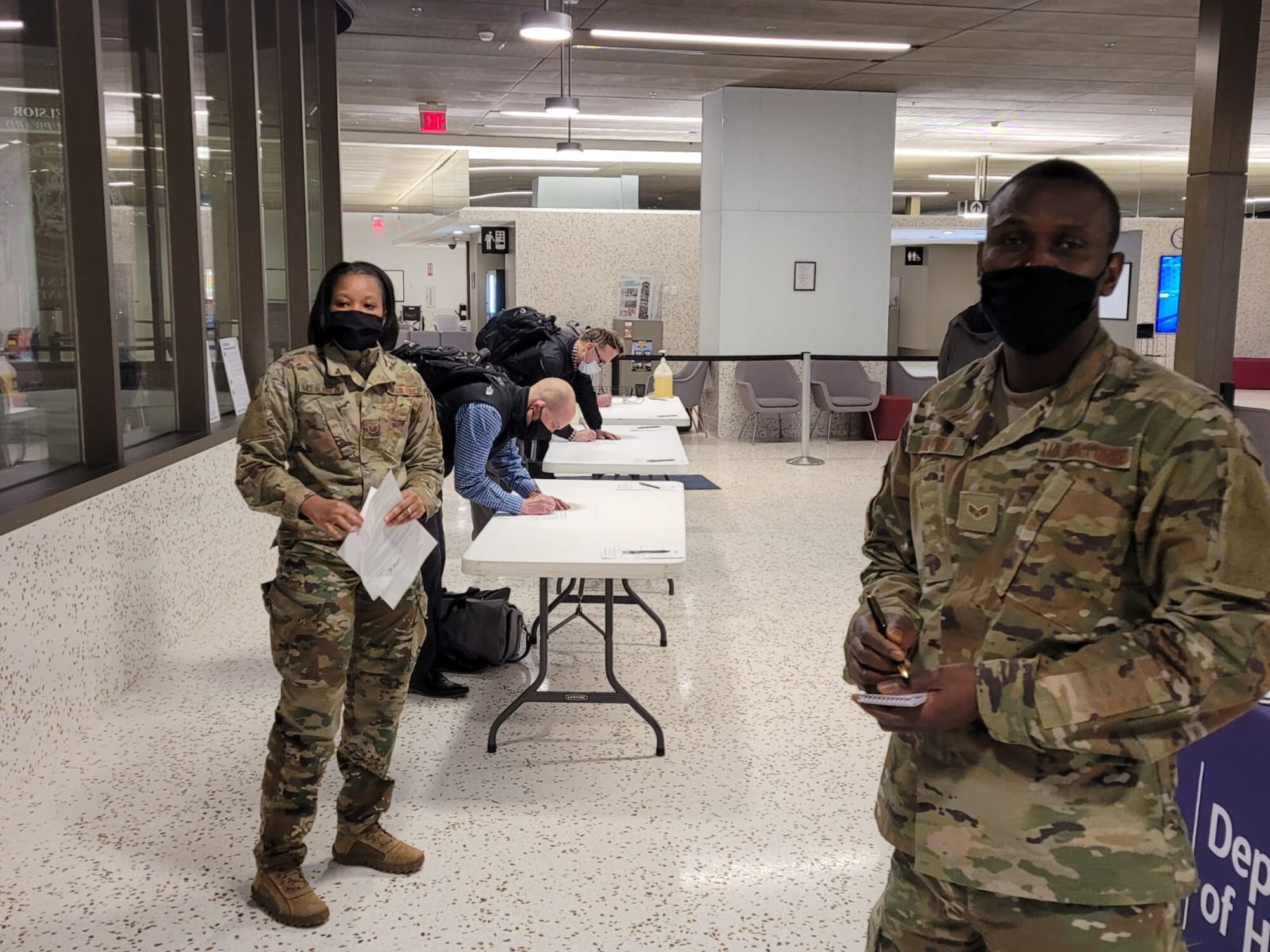 New York National Guard Soldiers and Airmen are collecting health information forms from travelers arriving in New York from out-of-state and international destinations at 12 airports around the state.
