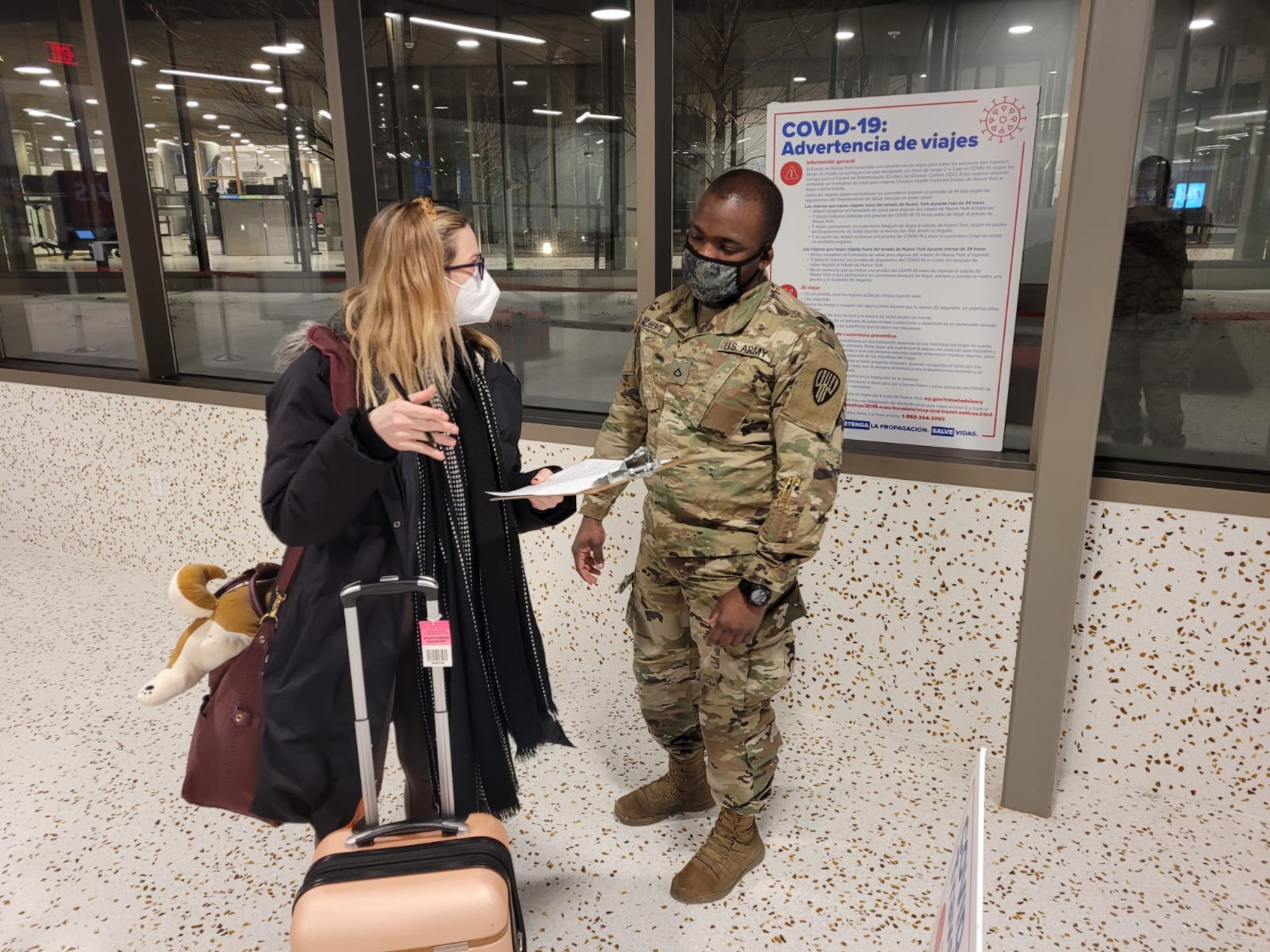 New York National Guard Soldiers and Airmen are collecting health information forms from travelers arriving in New York from out-of-state and international destinations at 12 airports around the state.