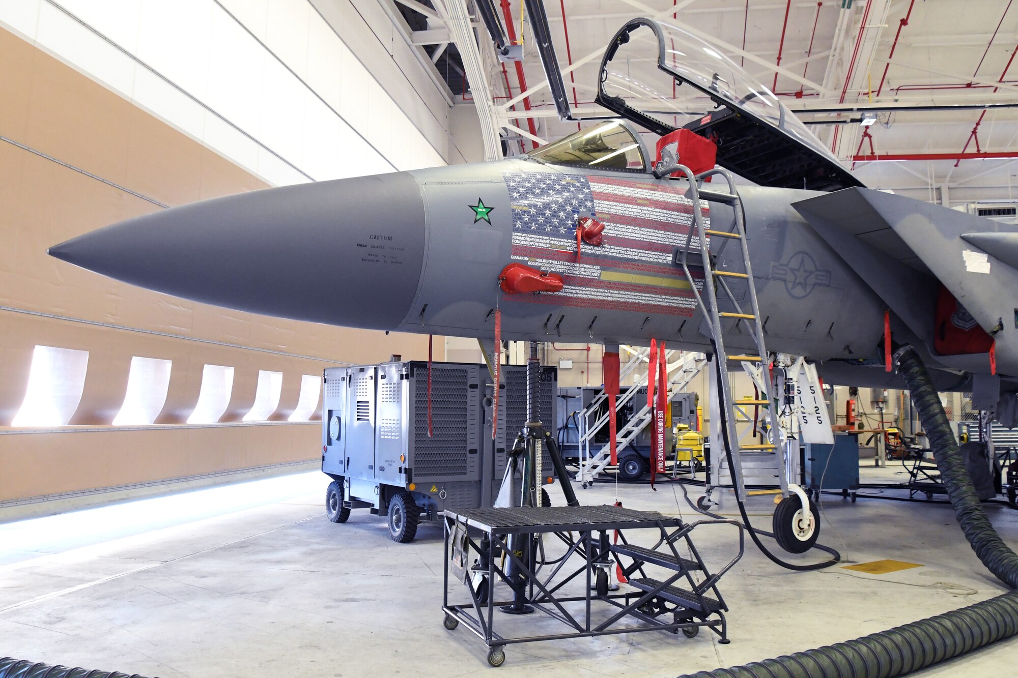 U.S. Air Force 104th Fighter Wing’s flagship F-15C Eagle sits in the base’s Main Hangar January 22, 2021, at Barnes Air National Guard Base, Mass. The F-15 received new decals that represent the American flag and every member in the wing. (U.S. Air National Guard photo by Staff Sgt. Hanna Smith)