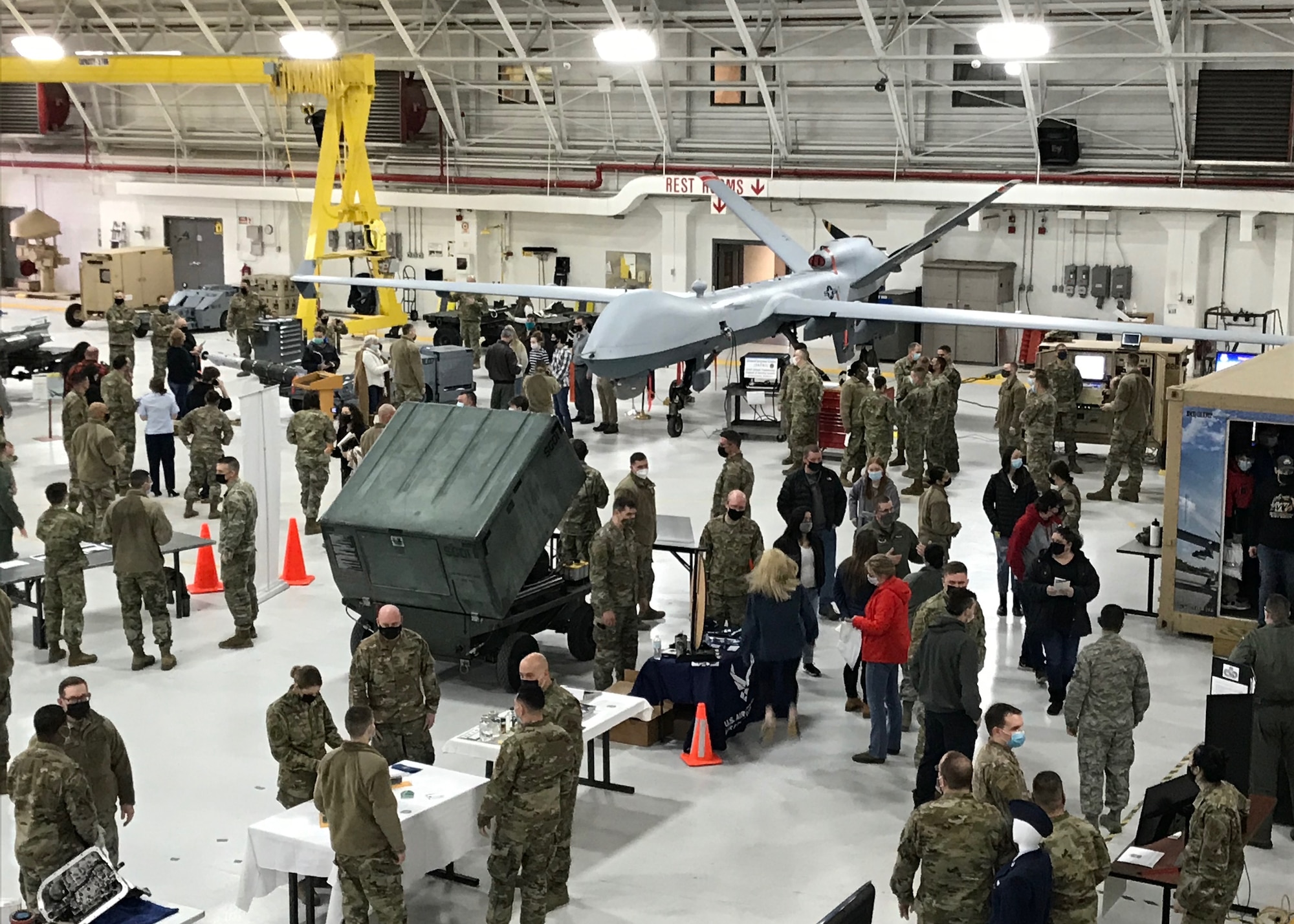 Members of the 174th Attack Wing speak with potential recruits during a career fair Feb. 6, 2021
