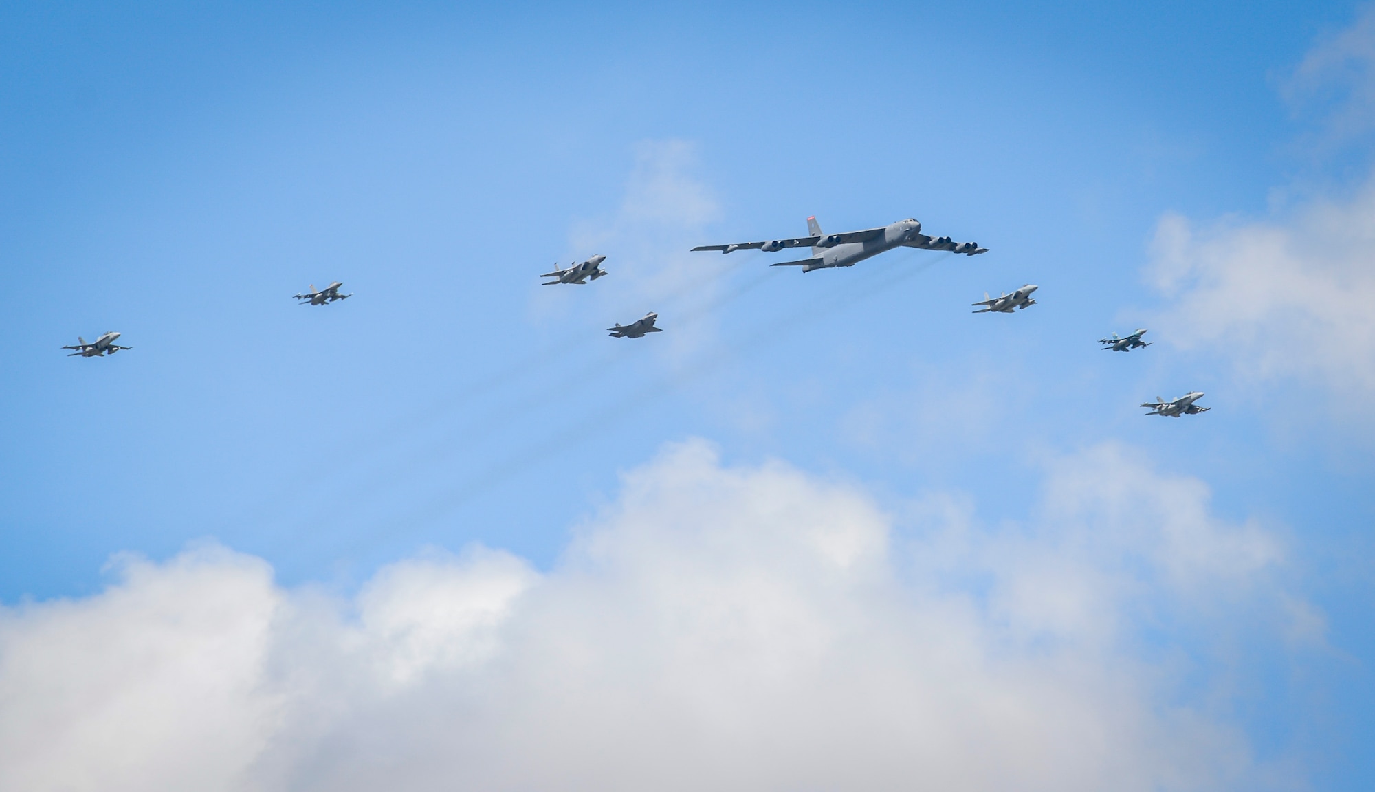 U.S. Air Force, Japan Air Self-Defense and Royal Australian Air Force aircraft fly in formation during Cope North 21 at Andersen Air Force Base, Guam, Feb. 9, 2021.