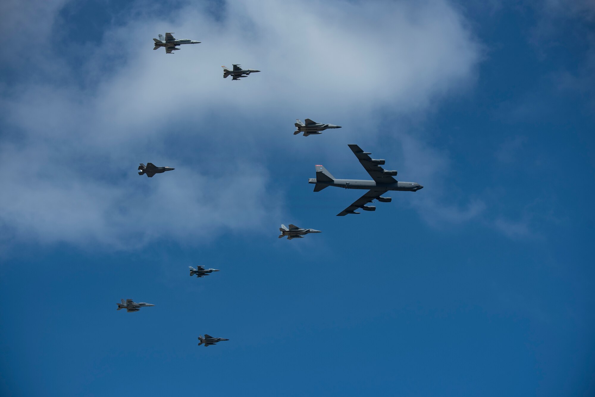 U.S. Air Force, Japan Air Self-Defense Force and Royal Australian Air Force aircraft fly in formation during exercise Cope North 21 at Andersen Air Force Base, Guam, Feb. 9, 2021.
