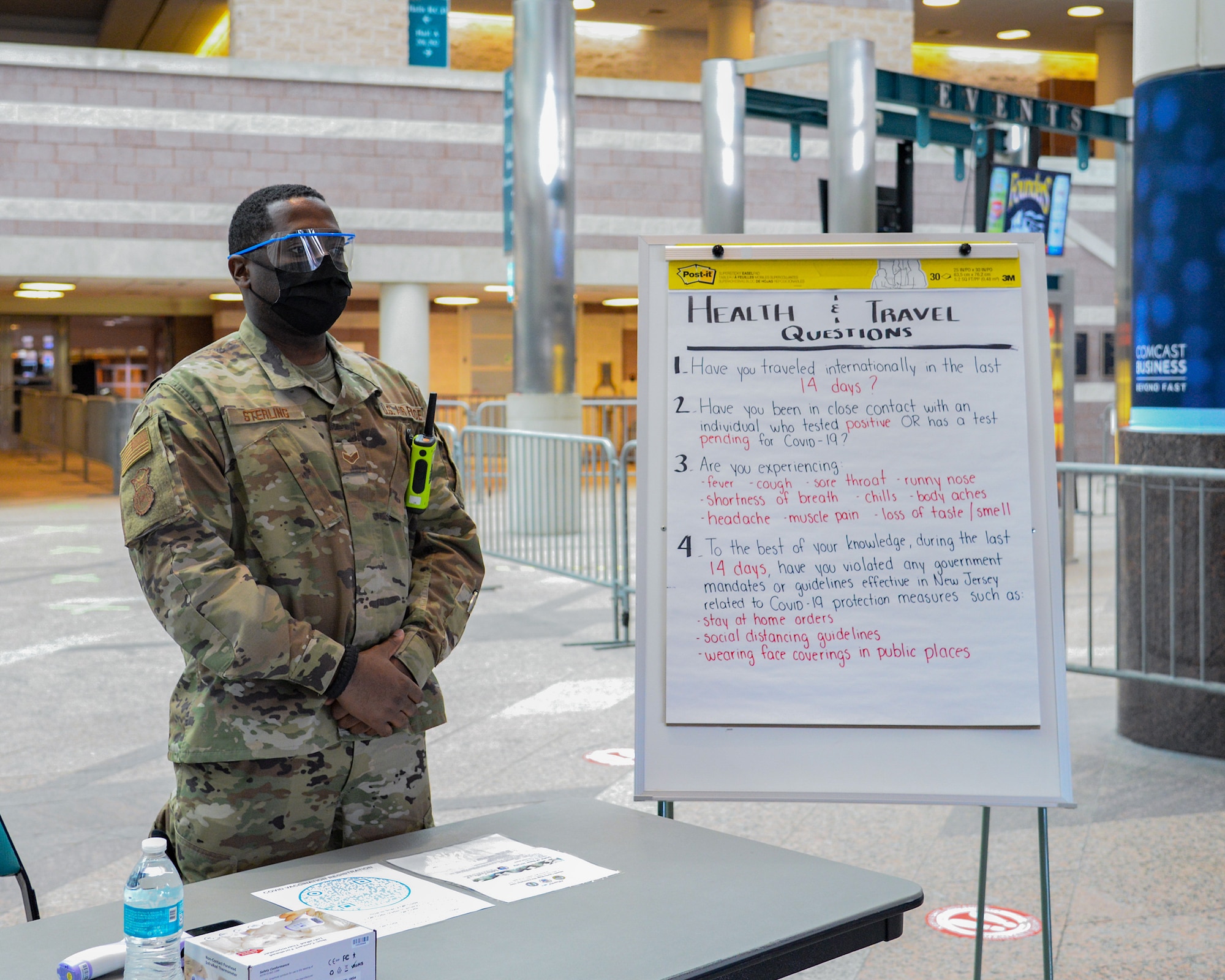 An image of a N.J. Air National Guard member serving at the Atlantic City Convention Center, Atlantic City, N.J., Jan. 27, 2021, which was set up as a COVID-19 vaccination Point of Distribution Center.