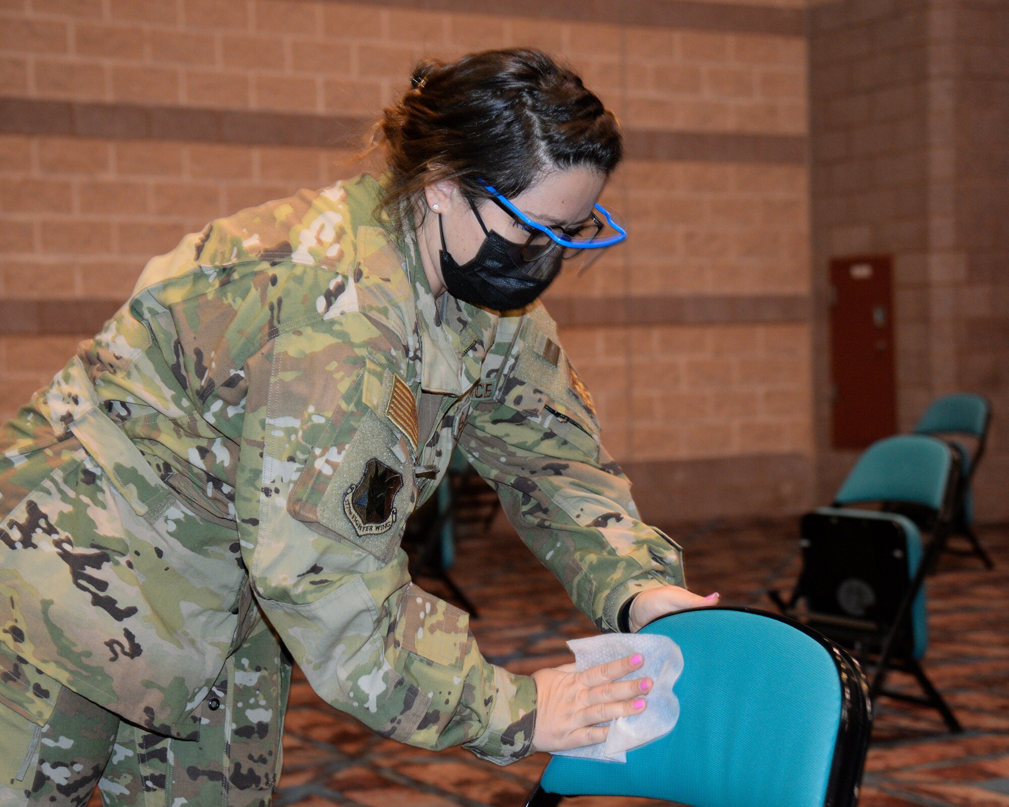 An image of a NJ Air National Guard member serving at the Atlantic City Convention Center, Atlantic City, N.J., to help the residents of New Jersey receive the COVID-19 vaccination at the Atlantic County Point Of Distribution mega-site.