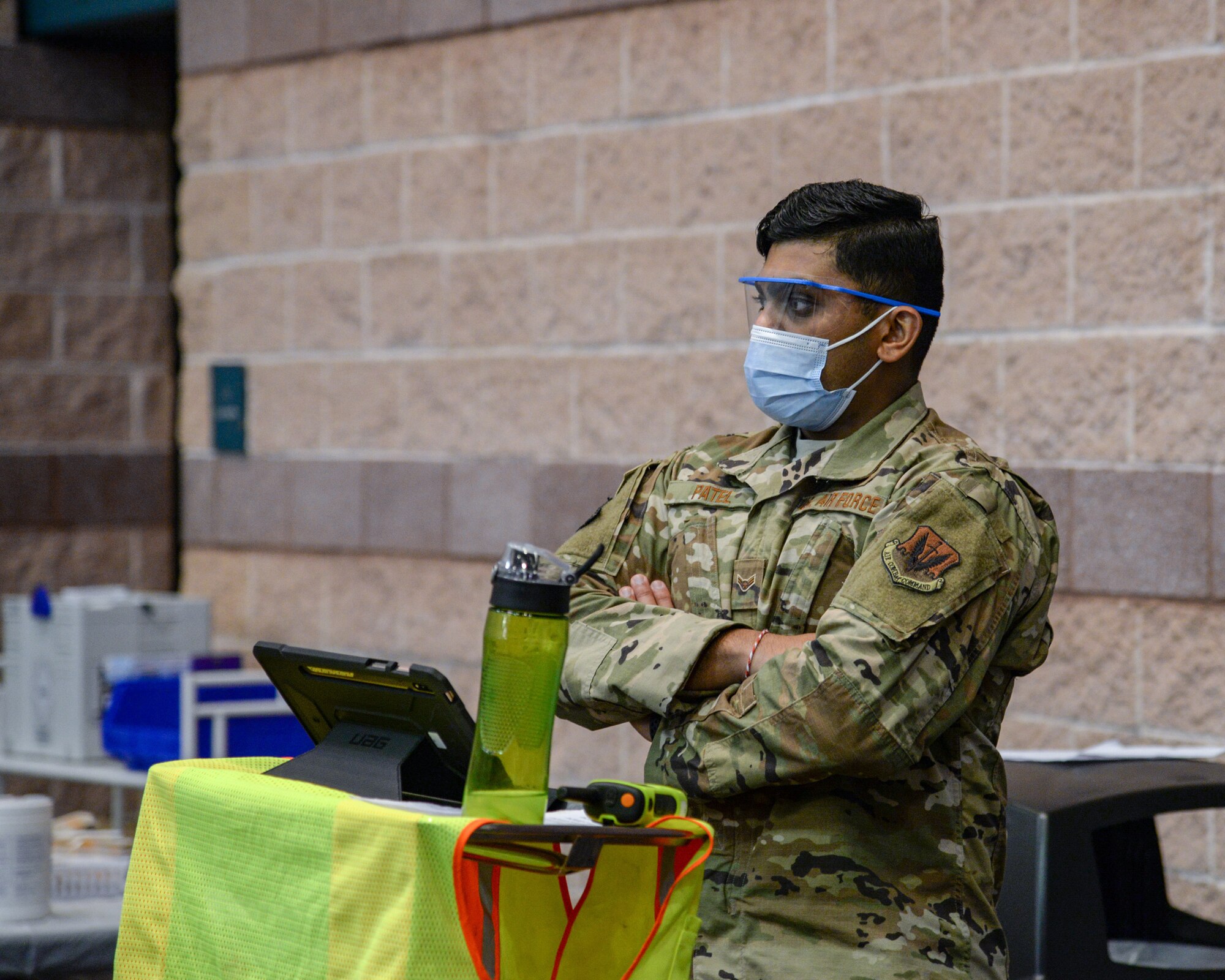 An image of a N.J. Air National Guard member serving at the Atlantic City Convention Center, Atlantic City, N.J., Jan. 27, 2021, which was set up as a COVID-19 vaccination Point of Distribution Center.