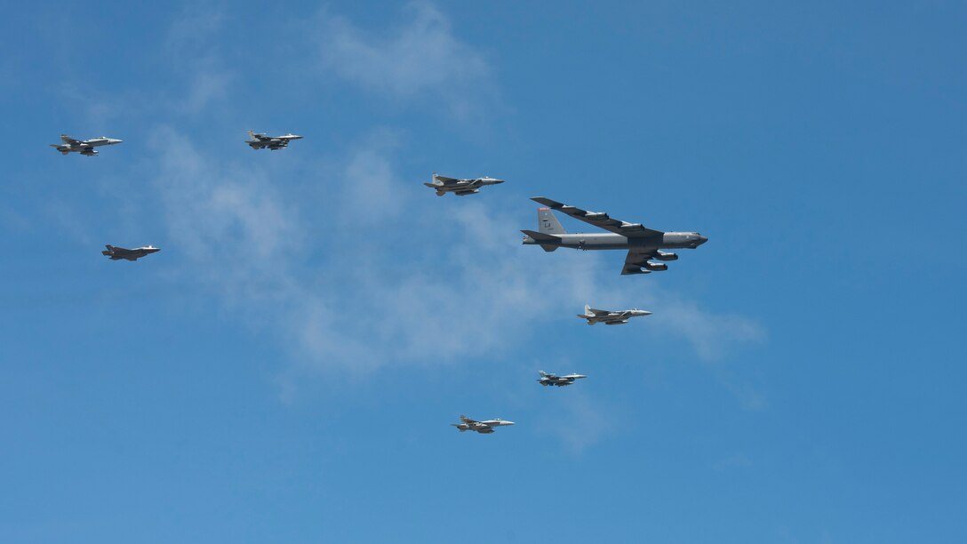 U.S. Air Force, Japan Air Self-Defense Force, or Koku-Jieitai, and Royal Australian Air Force aircraft fly in formation during exercise Cope North 21, at Andersen Air Force Base, Guam, Feb. 9, 2021.