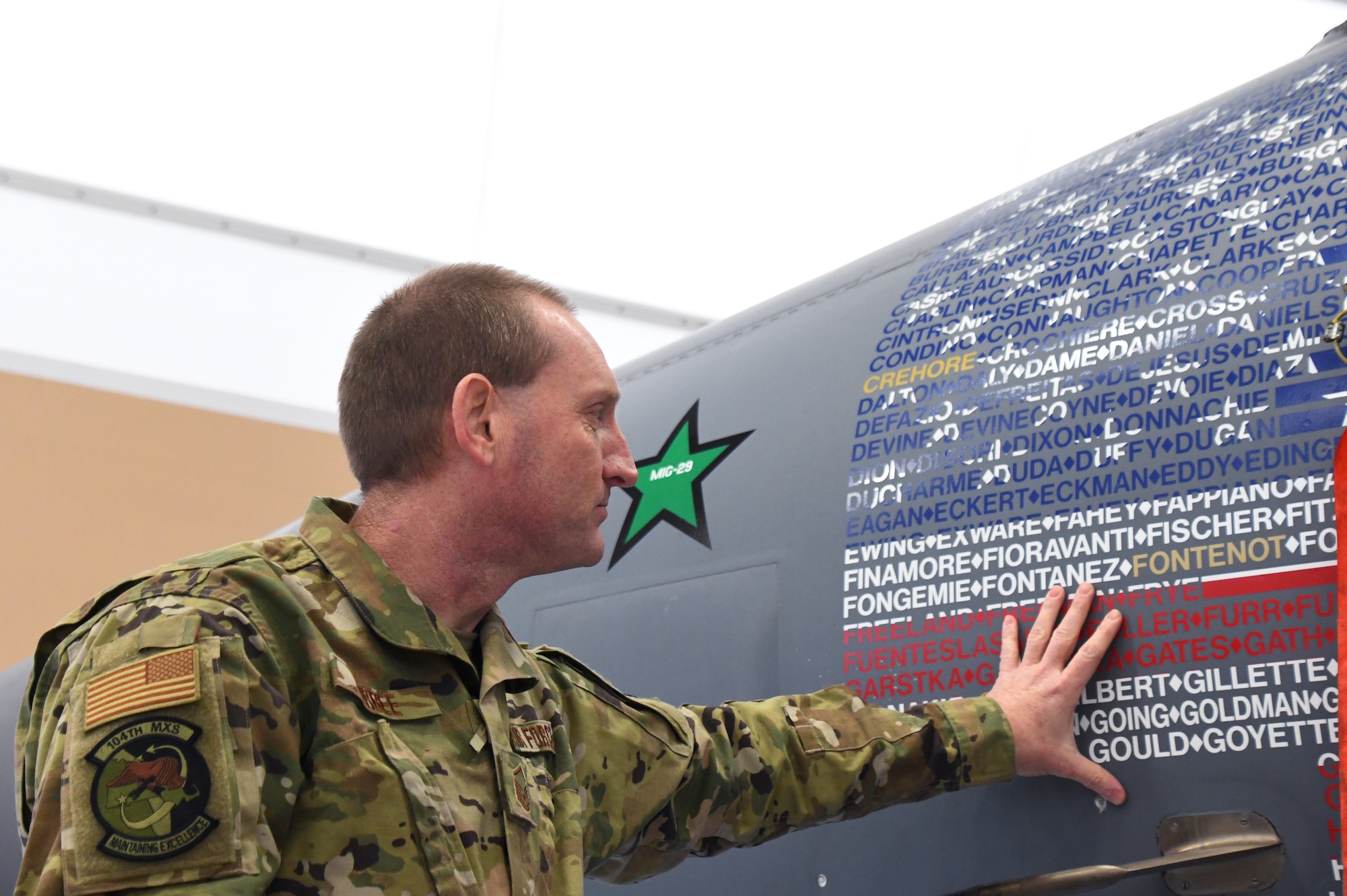 U.S. Air Force 104th Fighter Wing’s flagship F-15C Eagle sits in the base’s Main Hangar January 22, 2021, at Barnes Air National Guard Base, Mass. The F-15 received new decals that represent the American flag and every member in the wing. (U.S. Air National Guard photo by Staff Sgt. Hanna Smith)