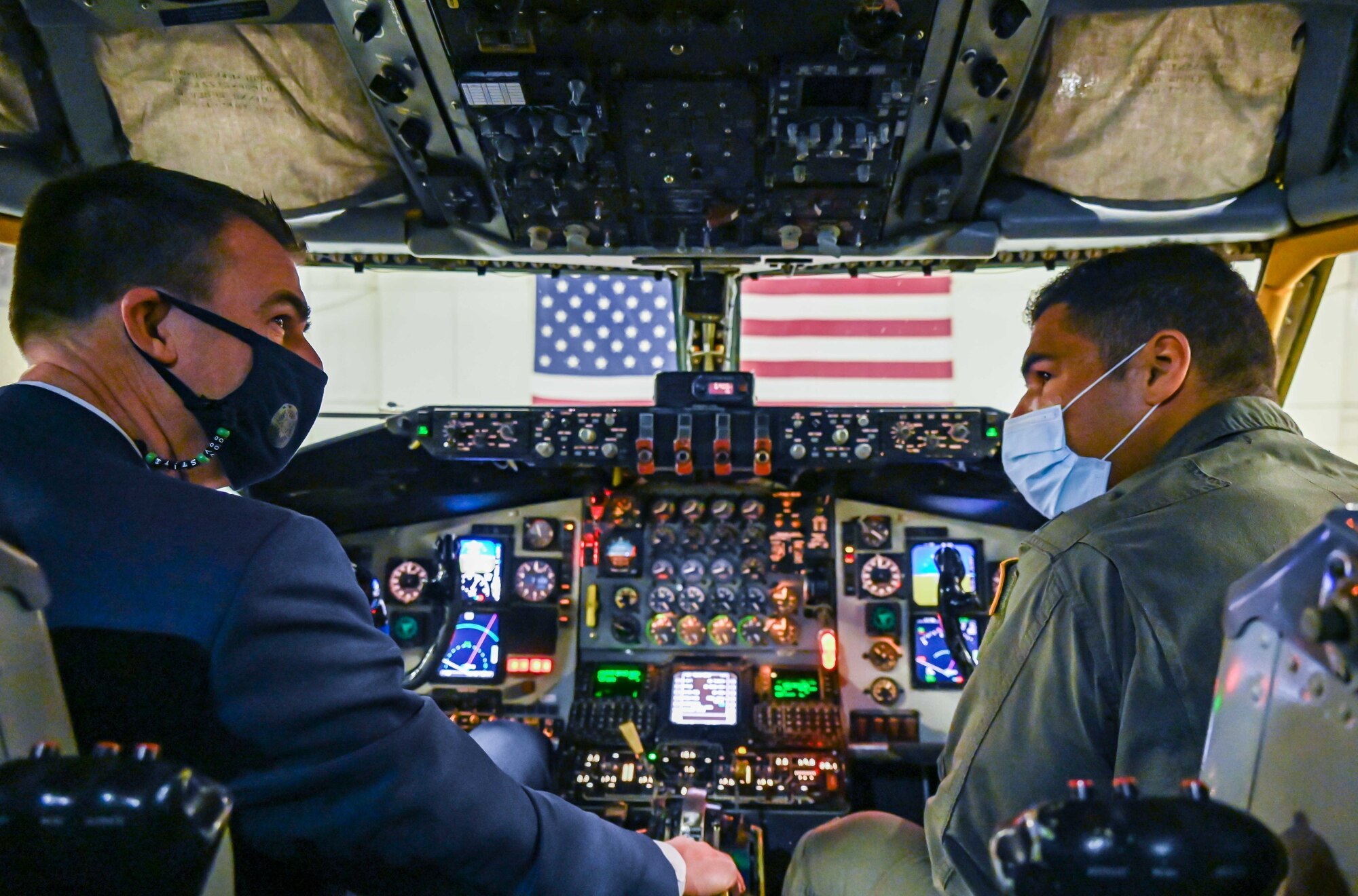 1st Lt. Aaron Price, 465th Air Refueling Squadron pilot, shows the Honorable J. Kevin Stitt, Governor of Oklahoma, the inside of the KC-135R Stratotanker during a visit to the 507th Air Refueling Wing, Feb. 5, 2021, at Tinker Air Force Base, Oklahoma. (U.S. Air Force photo by Senior Airman Mary Begy)