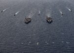 The Theodore Roosevelt and Nimitz Carrier Strike Groups steam in formation on scheduled deployments to the 7th Fleet area of operations. As the U.S. Navy's largest forward-deployed fleet, 7th Fleet routinely operates and interacts with 35 maritime nations while conducting missions to preserve and protect a free and open Indo-Pacific Region.