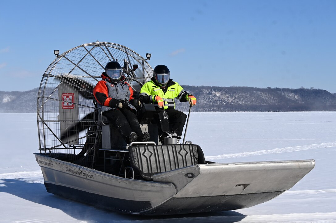 Crew ride airboat to conduct ice surveys