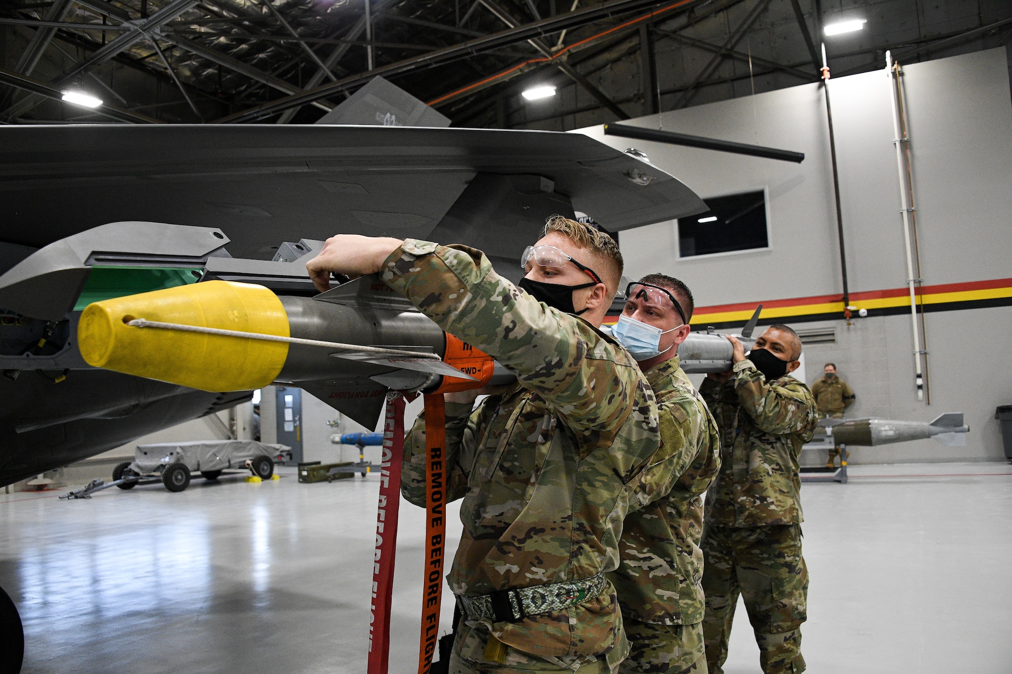 Air Force Reserve maintainers from the 466th Aircraft Maintenance Unit participate in an annual F-35 weapons load competition