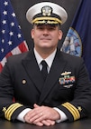 Studio portrait of Cmdr. Ethan A. Reber