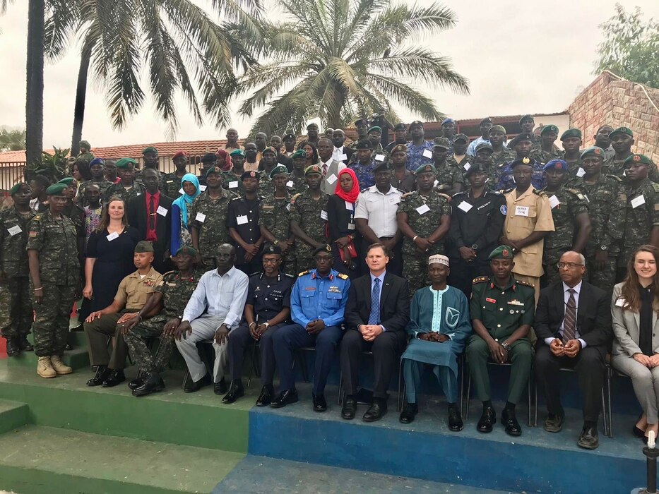 Capt Defay provided support to the Naval Postgraduate School's Institute for Security Governance in The Gambia. The event involved strengthening the bond between civilian leaders, the media, and the Gambian Armed Forces to promote democracy. Centered is U.S. Ambassador to The Gambia, Ambassador Richard Paschall and to his right was Chief of the Naval Staff, Commodore Senghor.
