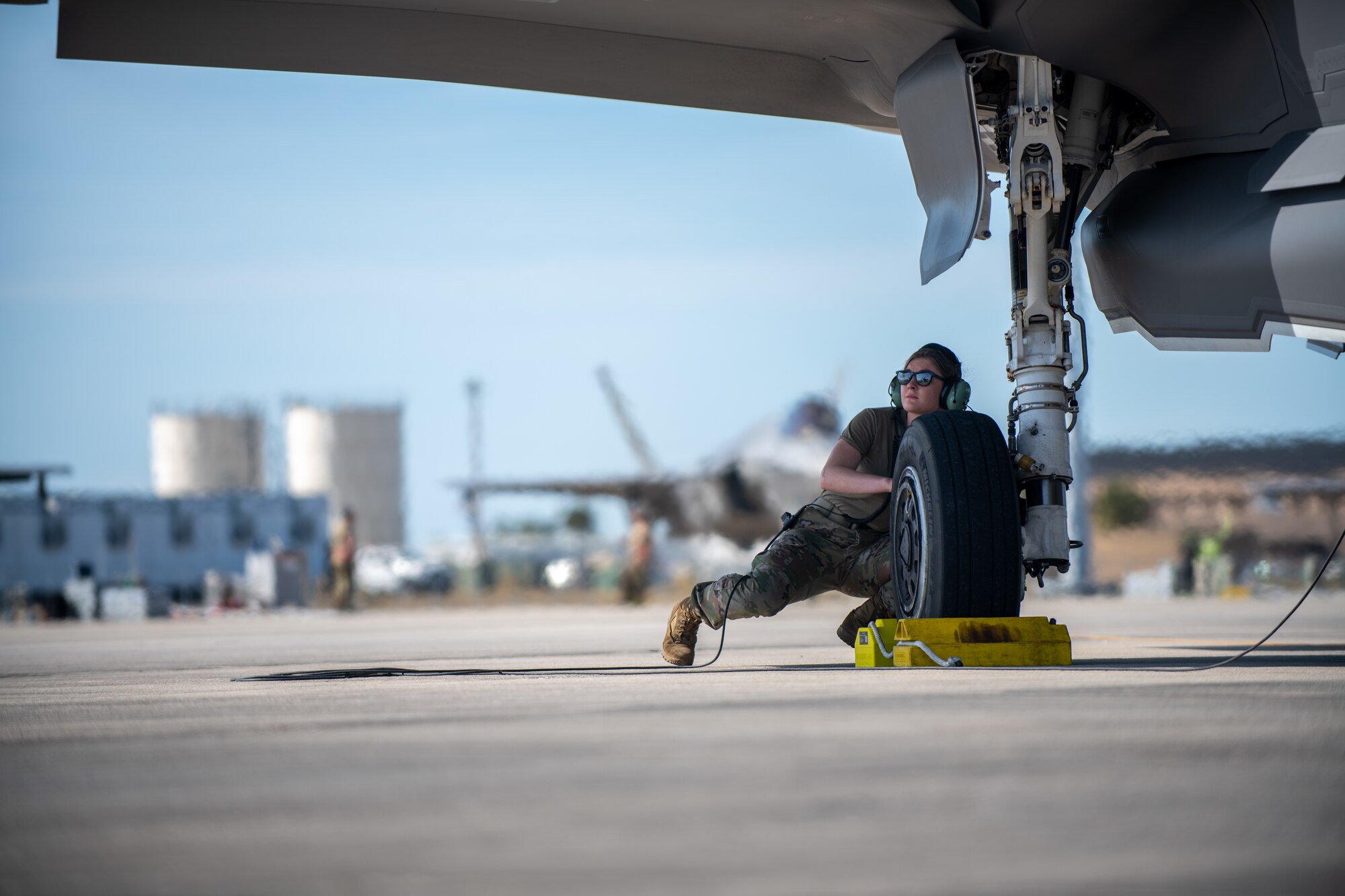 Senior Airman Isabel Murphy, a crew chief assigned to the 158th Maintenance Group, Vermont Air National Guard, prepares to launch an F-35A Lightning II during a training exercise.