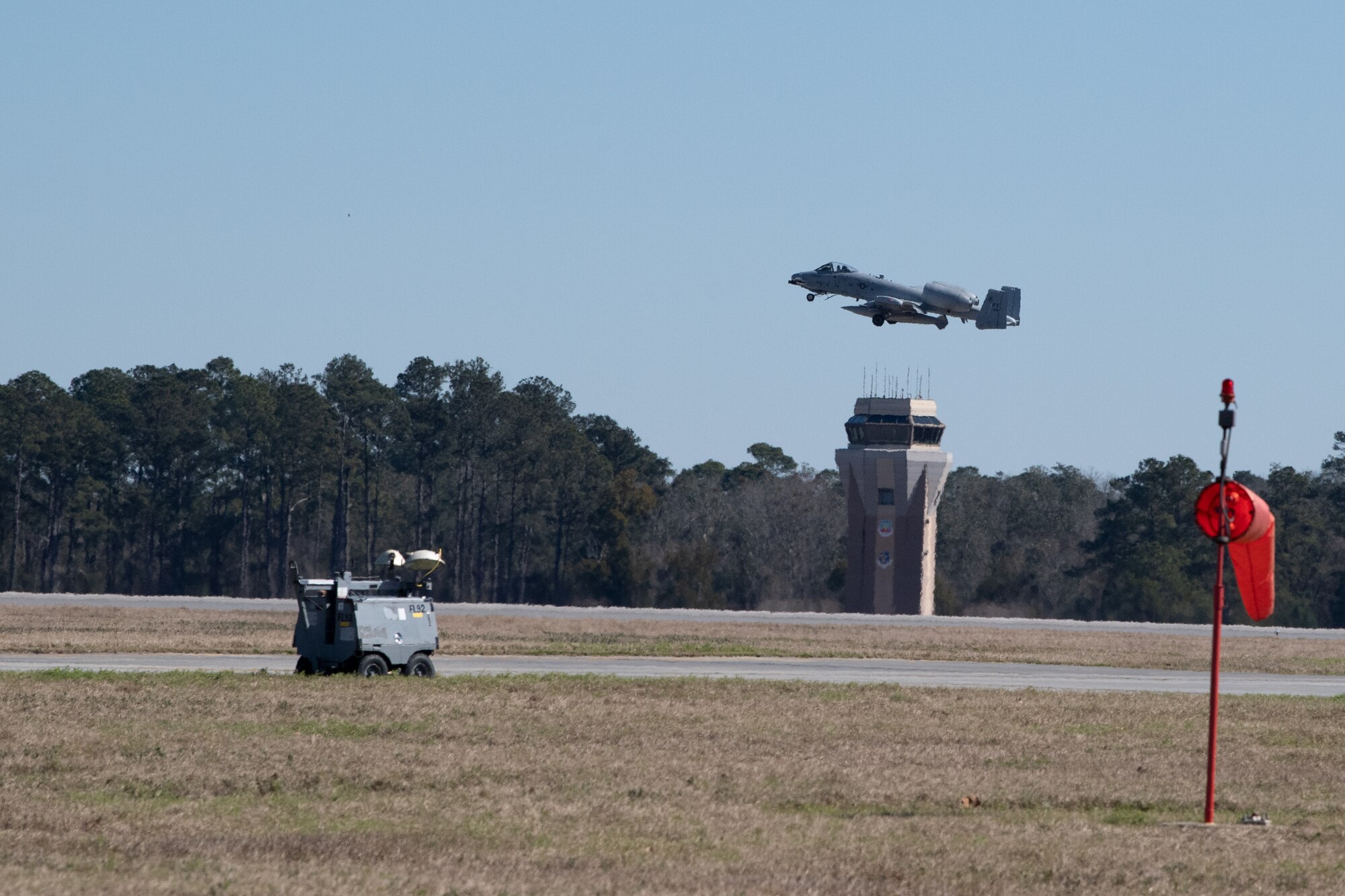 A photo of an aircraft taking off.