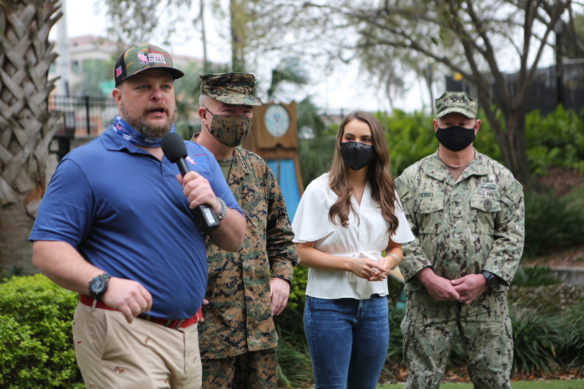 BJ Ganem, founder and CEO of Sierra Delta, a nonprofit aimed at connecting veterans with service dog training, addresses attendees during the ‘Salute-To-Service-Stroll’ Feb. 6, 2021, at the Tampa Riverwalk, Tampa, Florida. Ganem served nearly a decade in the Marine Corps before he was injured in Iraq in 2004, where he lost one of his legs. (U.S. Army photo by Spc. Robert Vicens)