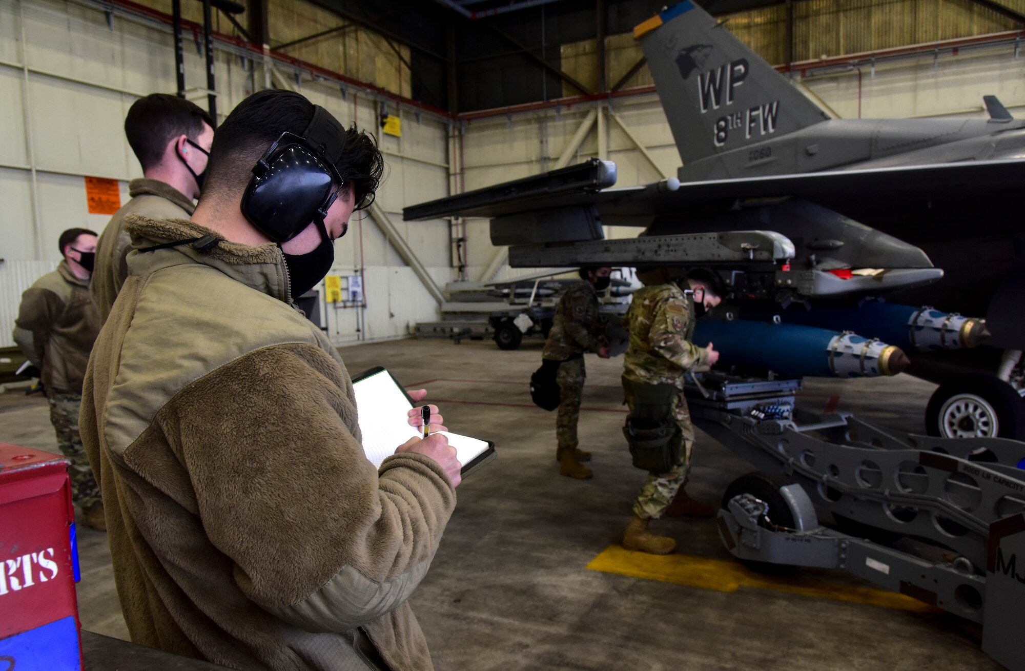 Airmen compete in a ammunition load competition.