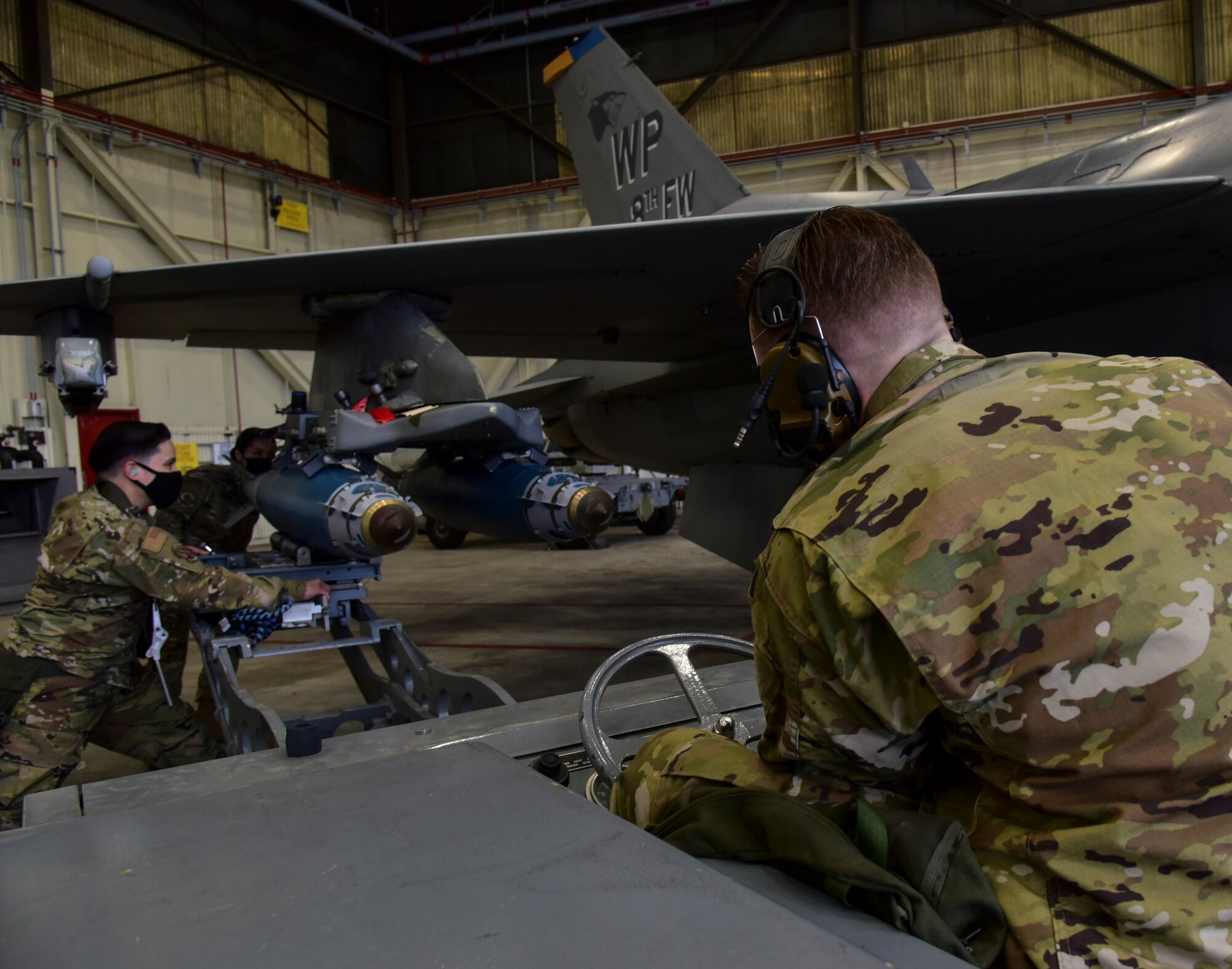 Airmen compete in a ammunition load competition.