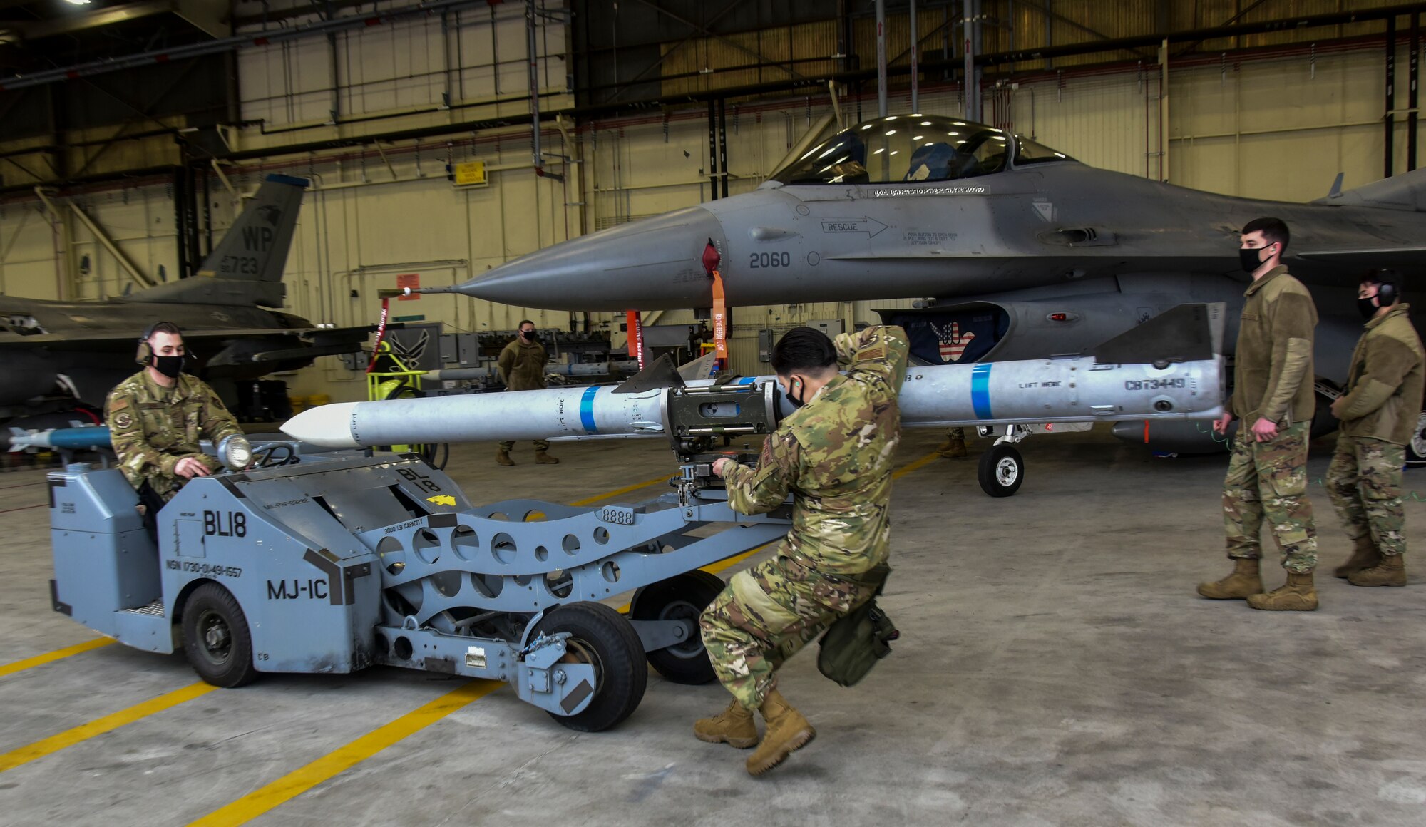 Airmen compete in a ammunition load competition.
