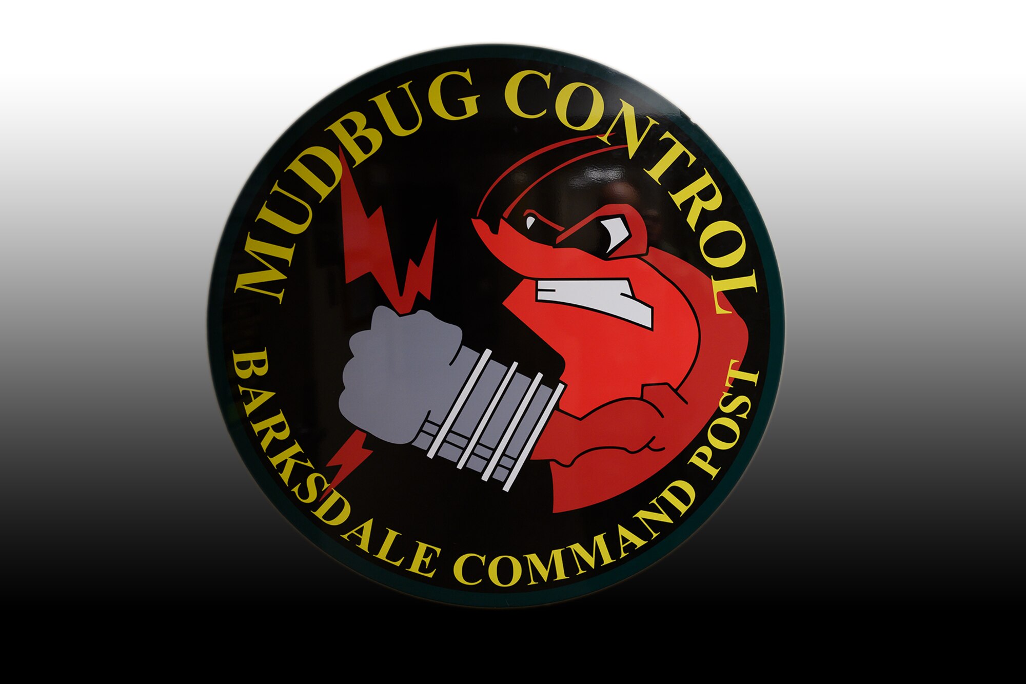 Barksdale Command Post logo showing a crawfish holding lightning in a gloved fist.