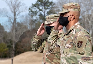 Commander of Air Force Reserve Command, Lt. Gen. Richard W. Scobee and AFRC’s command chief master sergeant, Timothy C. White, salute the arrival of Air Force Chief of Staff, Gen. Charles Q. Brown Jr., to Air Force Reserve Command headquarters on Robins Air Force Base in Georgia on Feb. 8, 2021. While at the headquarters, Brown discussed COVID-19 response efforts, diversity and inclusion issues, readiness, and the role of the Air Force Reserve in the future fight. (U.S. Air Force photo by Master Sgt. Stephen D. Schester)