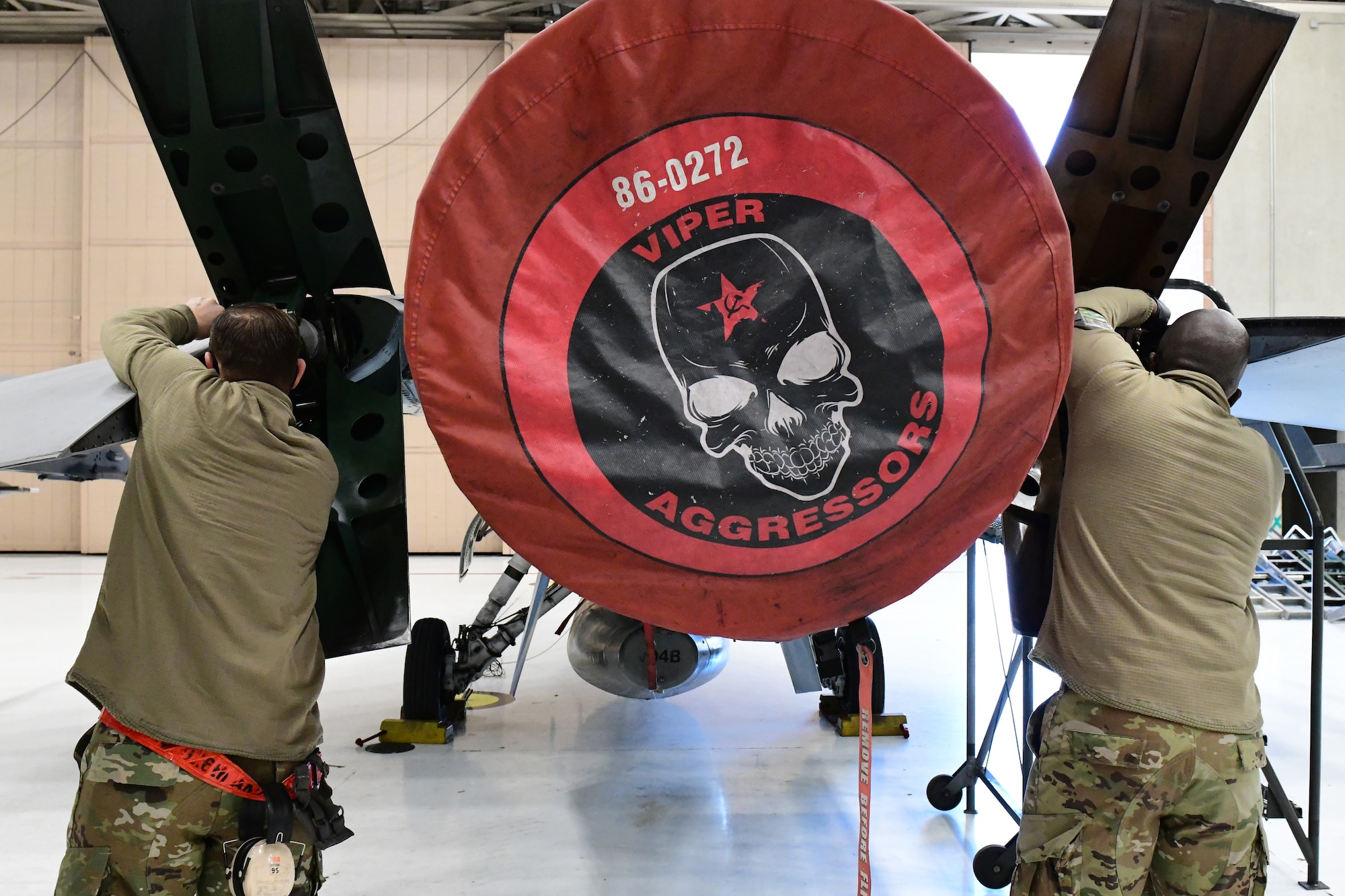 Staff Sgt.Darren Howell and Staff Sgt. Gregory Deas, the 926th Aircraft Maintenance Squadron, work to ensure an aircraft is fit to be back into the flying rotation, Feb. 6, at Nellis Air Force Base, Nevada.