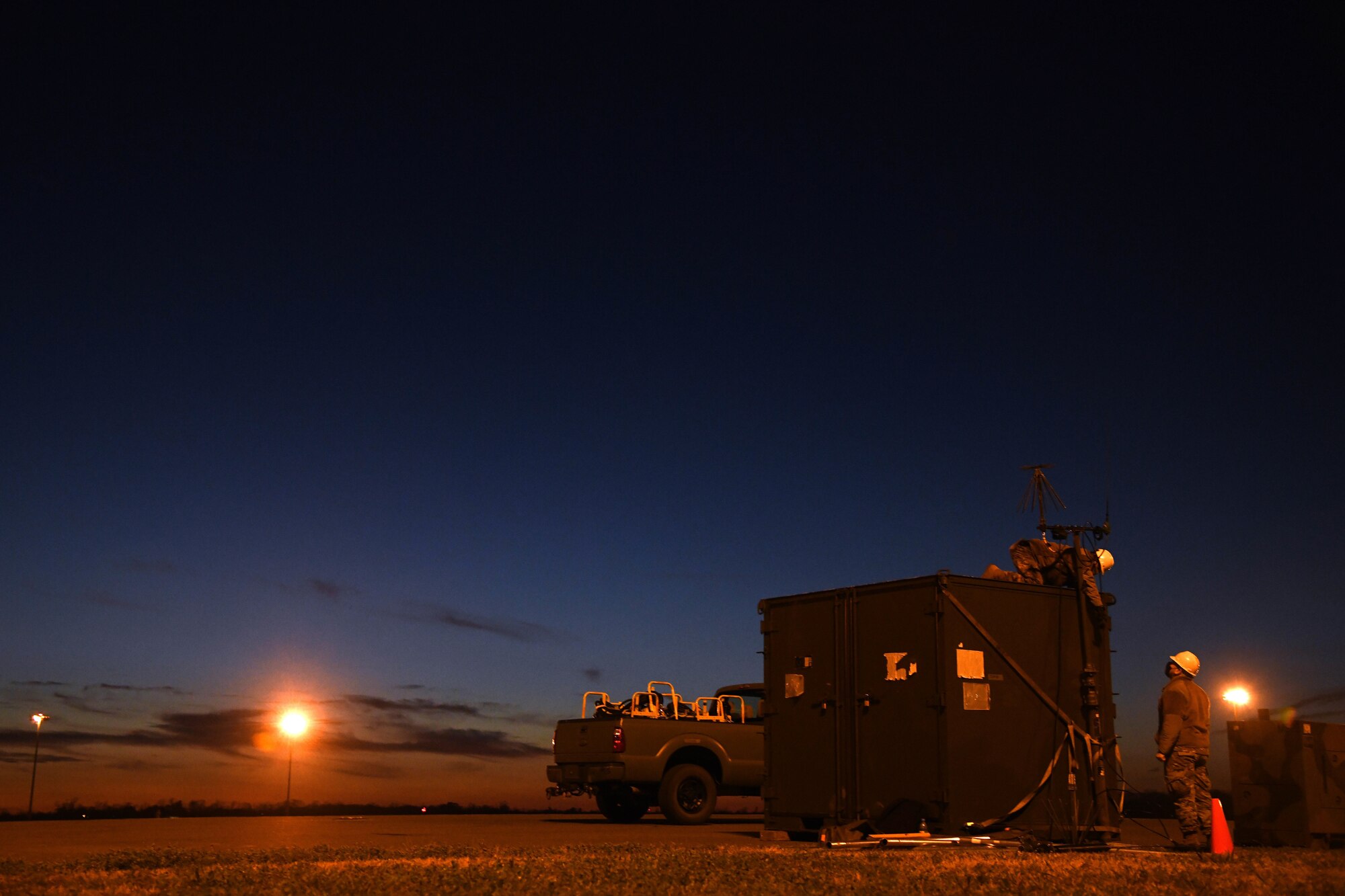 U.S. Airmen from the 621st Contingency Response Group set up a line-of-sight antenna to support communication devices Feb. 1, 2021, at Alexandria International Airport, Louisiana. Airmen from the 621st CRG participated in a Joint Readiness Training Center exercise Jan. 31-Feb. 9 at the airport and a nearby landing zone. (U.S. Air Force photo by Master Sgt. Melissa B. White)