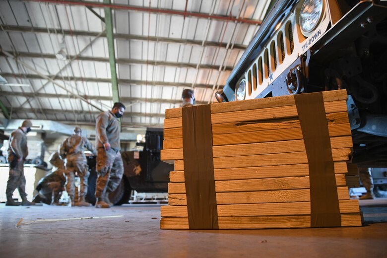 U.S. Airmen from the 621st Contingency Response Group conduct joint inspections for U.S. Army vehicles and equipment Feb. 1, 2021, at the Alexandria International Airport, Louisiana, to ensure they are safe for aircraft transport. Airmen from the 621st CRG participated in a Joint Readiness Training Center exercise Jan. 31-Feb. 9 at the airport and a nearby landing zone. (U.S. Air Force photo by Master Sgt. Melissa B. White)