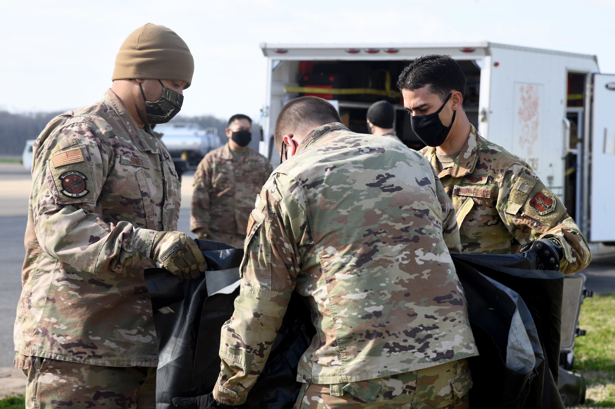 U.S. Airmen from the 621st Contingency Response Group and the 156th CRG prepare supplies during setup of the tactical operations center Jan. 31, 2021, at the Alexandria International Airport, Louisiana. The Airmen integrated with their total force partners from the Puerto Rico Air National Guard’s 156th CRG as well as the 452nd Contingency Response Squadron from March Air Reserve Base, California, during a Joint Readiness Training Center exercise Jan. 31-Feb. 9 in Louisiana. (U.S. Air Force photo by Master Sgt. Melissa B. White)