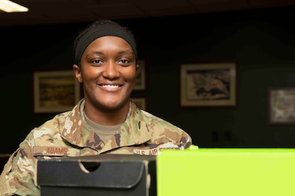 An Airman smiles for a photo