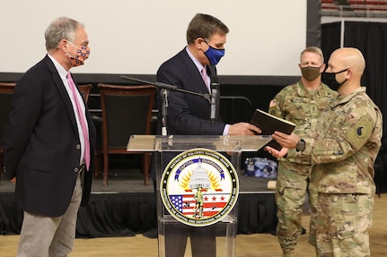 Senator Mark Warner and Senator Tim Kaine present thank you letters to Col. Chris Samulski, commander of the Virginia National Guard’s 116th Infantry Brigade Combat Team, Feb. 8, 2021, in Washington, D.C.