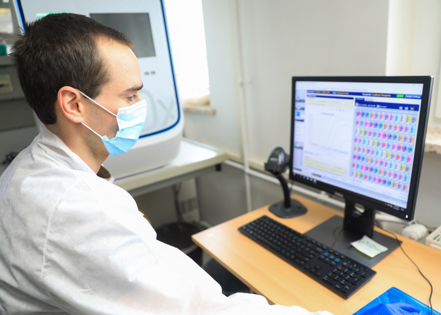 Capt. Cole Anderson, chief, Microbiology, Landstuhl Regional Medical Center, reviews test results of COVID-19 specimens at LRMC’s Infectious Disease Laboratory, Feb. 10. Landstuhl Regional Medical Center recently surpassed 100,000 COVID-19 tests since its first test on March 6, 2020.