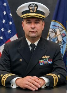 Studio portrait of Lt. Cmdr. Greg Piorun