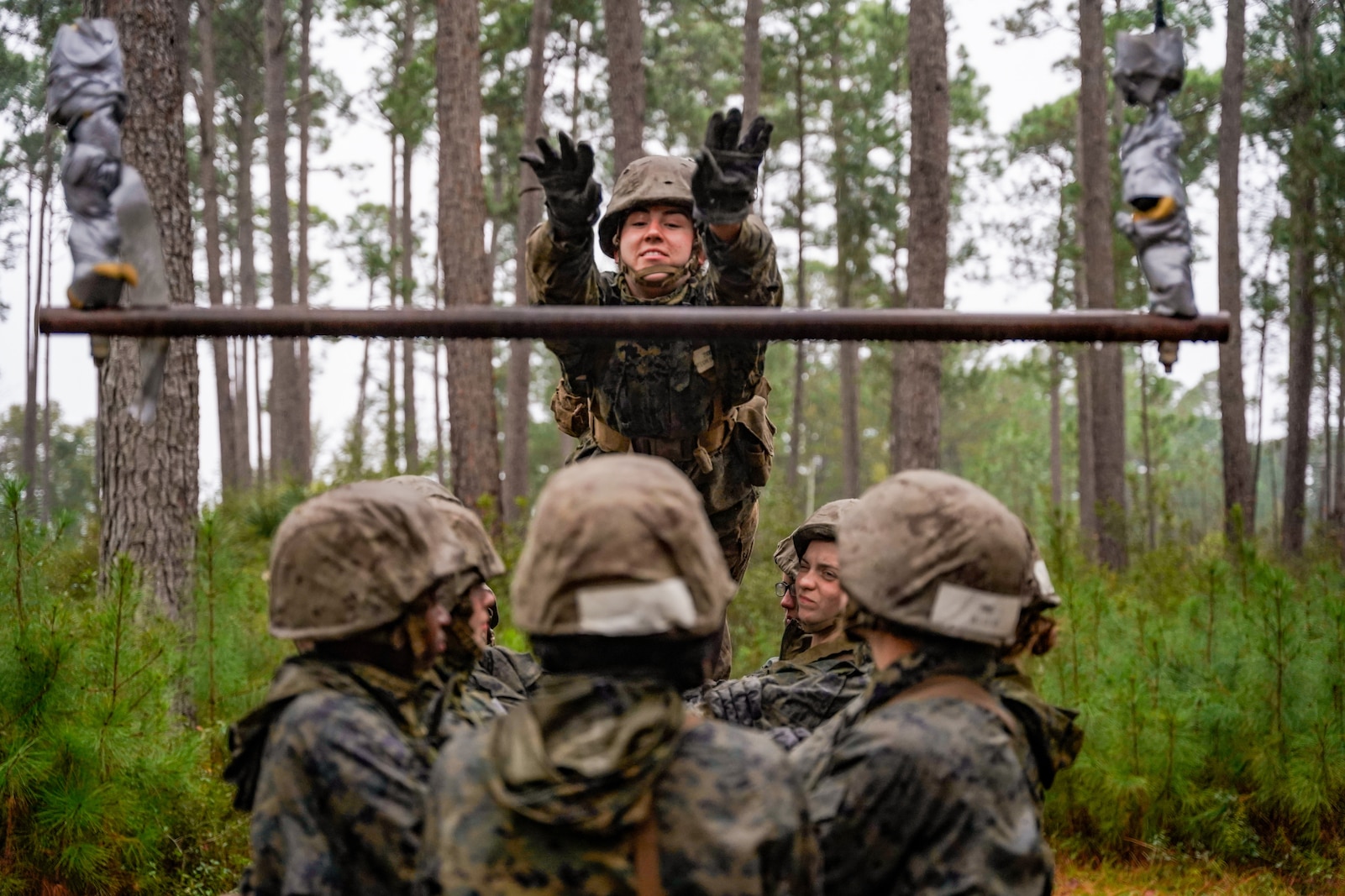 A recruit with Hotel Company, 2nd Recruit Training Battalion leaps to complete an obstacle during the Crucible Jan. 15, 2020 at Marine Corps Recruit Depot Parris Island, S.C. The Crucible is recruit training’s 54-hour culminating event that involves food and sleep deprivation and the completion of myriad events for recruits to complete in order to claim the title United States Marine.