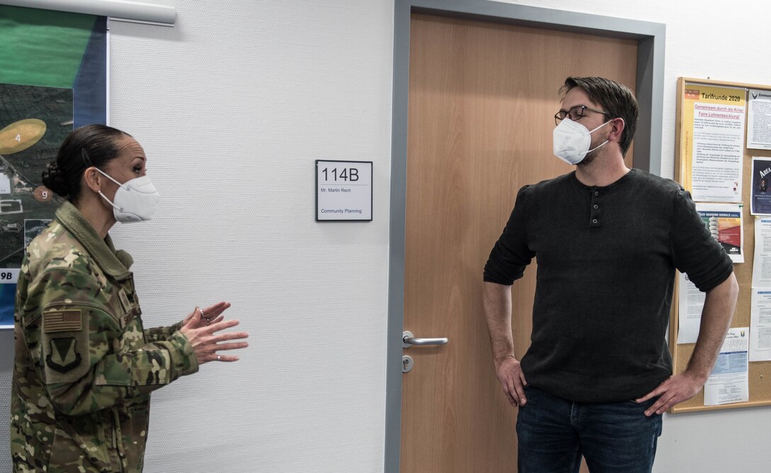 The 86th Airlift Wing Command Chief Master Sgt. Hope Skibitsky recognizes Holger Kehrer, 86th Civil Engineer Squadron Engineering flight programs specialist, as Airlifter of the Week at Ramstein Air Base Germany, Feb. 4, 2021.
