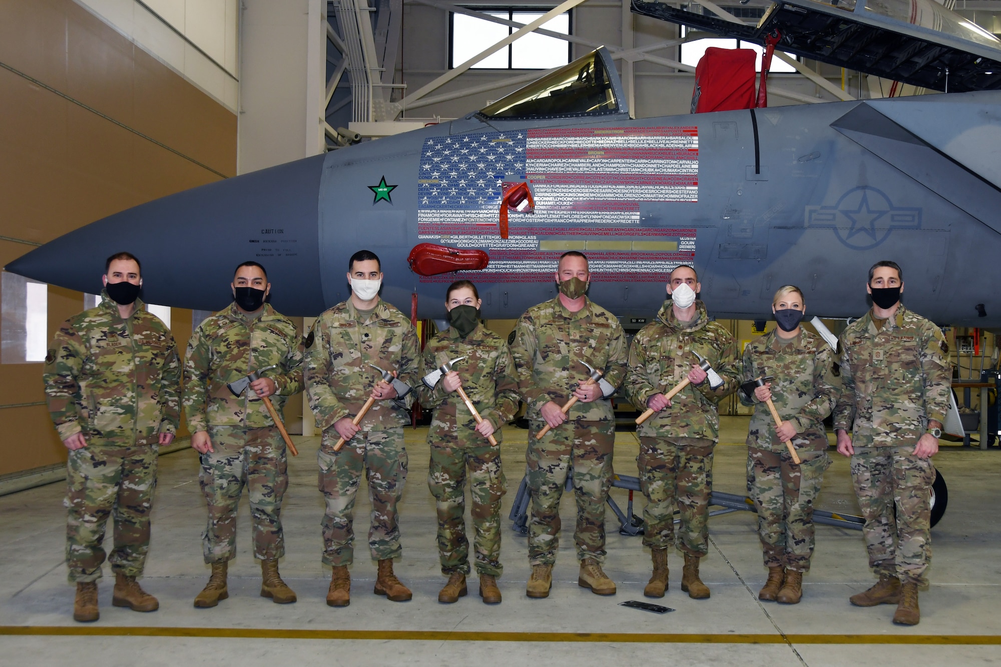 104th Fighter Wing 2020 Annual Award winners pose for a photo in front of an F-15C Eagle at Barnes Air National Guard Base, Massachusetts. The 104FW held an Annual Award ceremony which recognized the 104FW’s top performers in 2020. (U.S. Air National Guard photo by Staff Sgt. Hanna Smith)